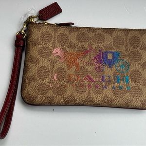 Coach leather wristlet with Rexy, glitter and ombre design